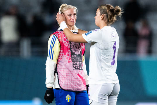 Sofia Jakobsson of Sweden looks dejected and goalkeeper