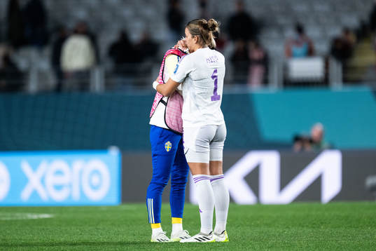 Sofia Jakobsson of Sweden looks dejected and is consoled by