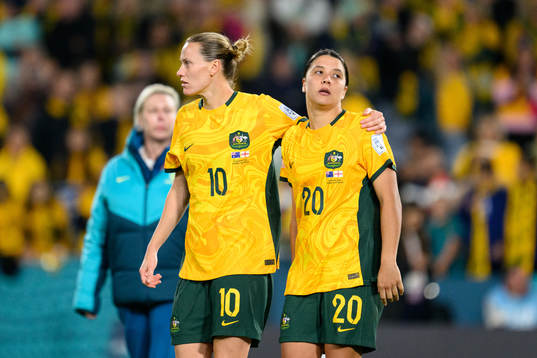Emily van Egmond and Sam Kerr look dejected