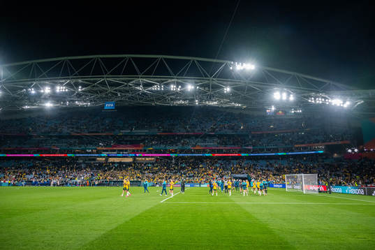 Players and staff of Australia look dejected as they