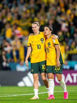 Emily van Egmond and Sam Kerr of Australia look dejected