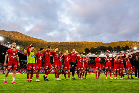 Players and staff of Brann celebrates
