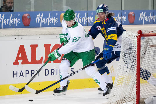 Linus Sjödin of Rögle and Michael Fora of Davos