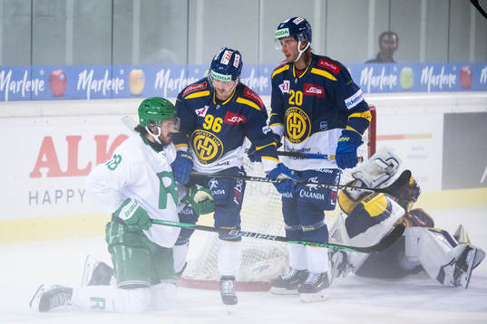 Dennis Everberg of Rögle and Chris Egli of Davos