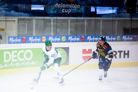 Felix Nilsson of Rögle and Sven Jung of Davos