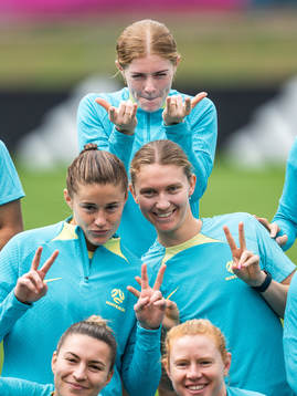 Cortnee Vine (top) with team mates of the Australian