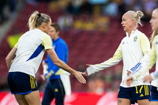 Fridolina Rolfö and Caroline Seger of Sweden