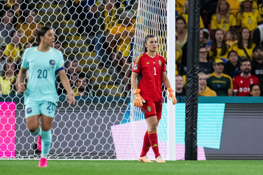 Sam Kerr of Australia and  goalkeeper Zecira Musovic of