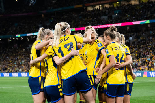 Fridolina Rolfö of Sweden celebrates with team mates