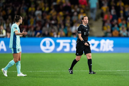 Caitlin Foord of Australia reacts to referee Cheryl Foster