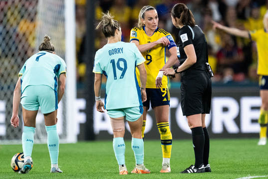 Katrina Gorry of Australia, Kosovare Asllani of Sweden and