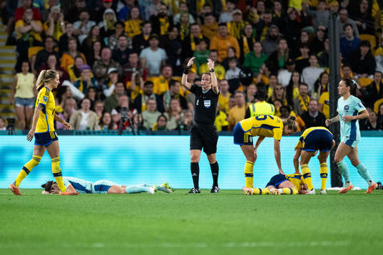 of Australia Caitlin Foord and Kosovare Asllani of Sweden