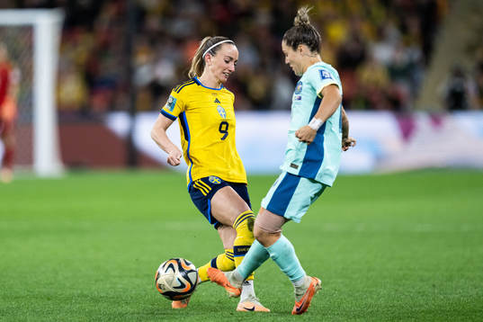 Kosovare Asllani of Sweden and Katrina Gorry of Australia