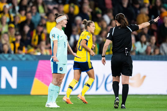 Caitlin Foord of Australia reacts to referee Cheryl Foster
