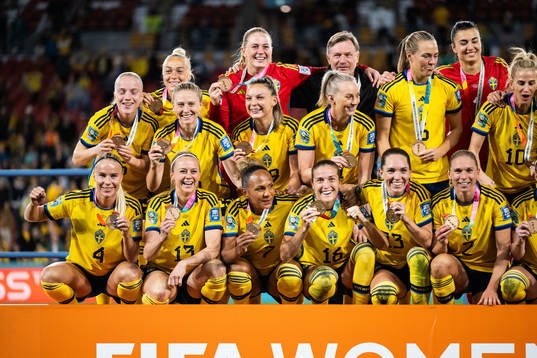 Players of Sweden celebrate with their bronze medals