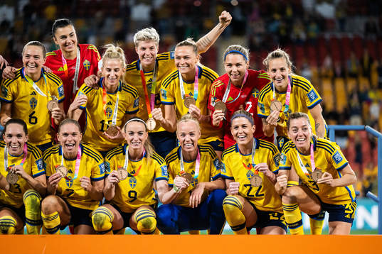 Players of Sweden celebrate with their bronze medals