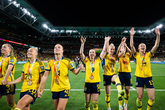 Players of Sweden celebrate with their bronze medals