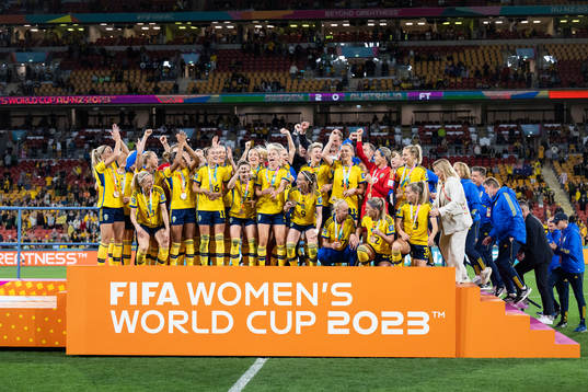 Players of Sweden celebrate with their bronze medals