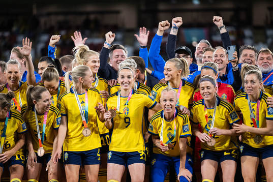 Players of Sweden celebrate with their bronze medals