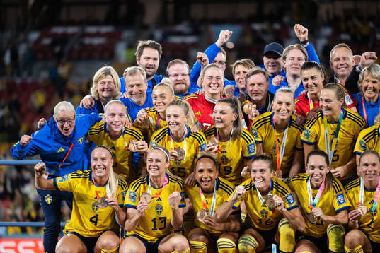 Players of Sweden celebrate with their bronze medals