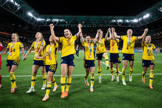 Players of Sweden celebrate with their bronze medals