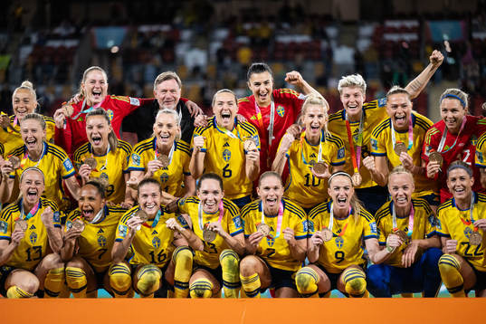 Players of Sweden celebrate with their bronze medals