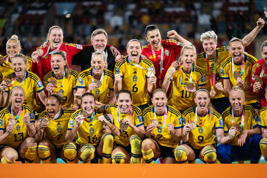 Players of Sweden celebrate with their bronze medals