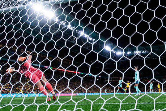 Kosovare Asllani of Sweden scores 2-0 behind goalkeeper