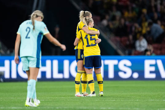 Fridolina Rolfö and Rebecka Blomqvist of Sweden celebrate