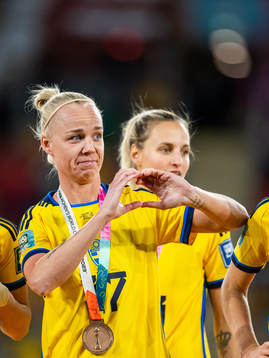 Caroline Seger of Sweden forms a heart with her hands at