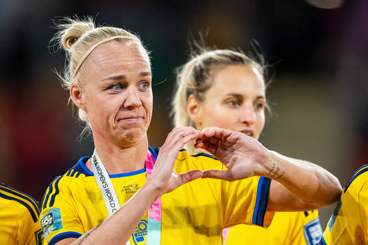 Caroline Seger of Sweden forms a heart with her hands at