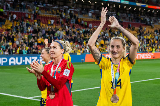 Goalkeeper Jennifer Falk and Nathalie Björn of Sweden