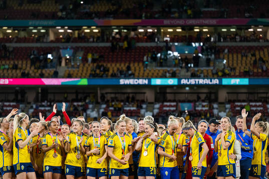 Players of Sweden celebrate with their medals