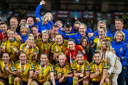 Players of Sweden celebrate with their medals