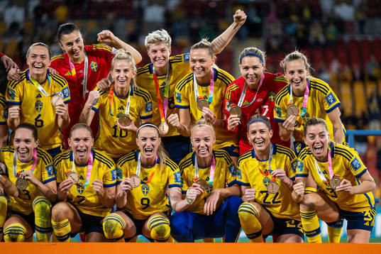 Players of Sweden celebrate with their medals