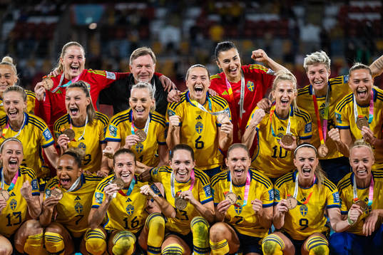 Players of Sweden celebrate with their medals