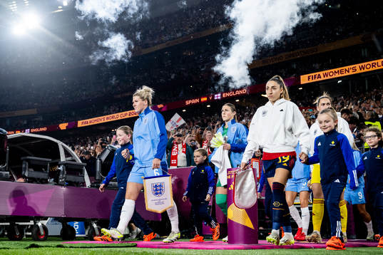 Millie Bright of England and Olga Carmona of Spain enters