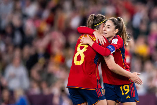 Mariona Caldentey and Olga Carmona of Spain celebrate