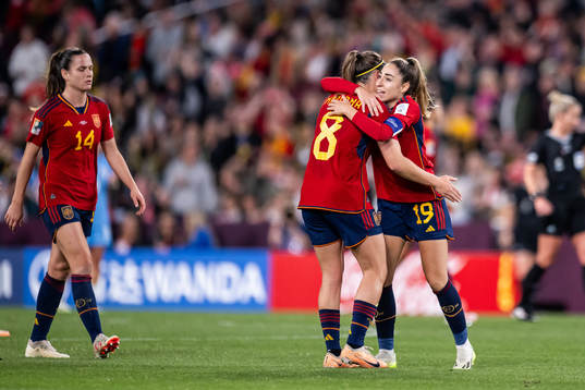 Mariona Caldentey and Olga Carmona of Spain celebrate