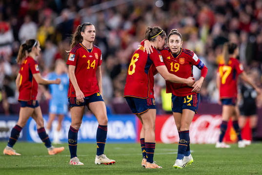 Mariona Caldentey and Olga Carmona of Spain celebrate