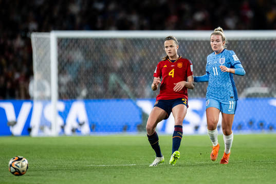 Irene Paredes of Spain and Lauren Hemp of England
