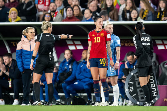 Head coach Sarina Wiegman of England, referee Tori Penso
