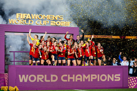 Players of Spain celebrate with the trophy