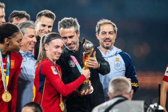 Maria Perez and Head coach Jorge Vilda of Spain celebrate