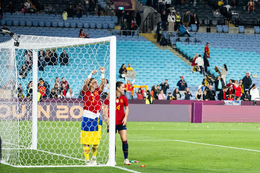 Goalkeeper Misa Rodriguez and Laia Codina of Spain