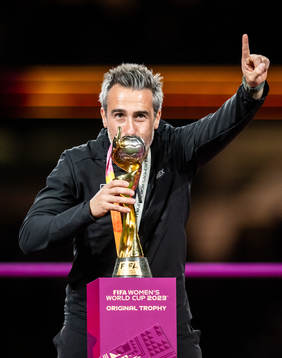 Head coach Jorge Vilda of Spain celebrates with the trophy