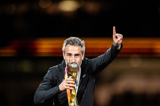 Head coach Jorge Vilda of Spain celebrates with the trophy