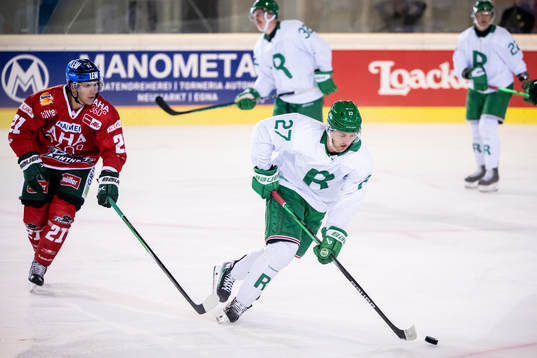 Linus Sjödin of Rögle and Jere Karjalainen of Augsburger
