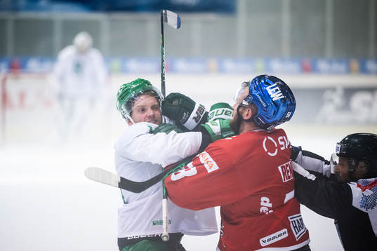 Simon Ryfors of Rögle fights with Max Renner of Augsburger