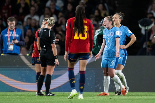 Keira Walsh of England reacts against referee Tori Penso